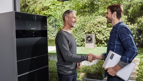Man and installer shaking hands