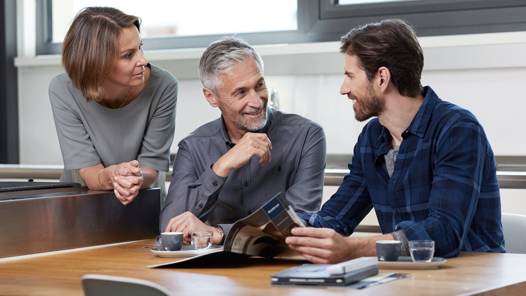 couple talking with installer