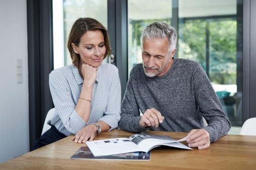 couple reading a brochure