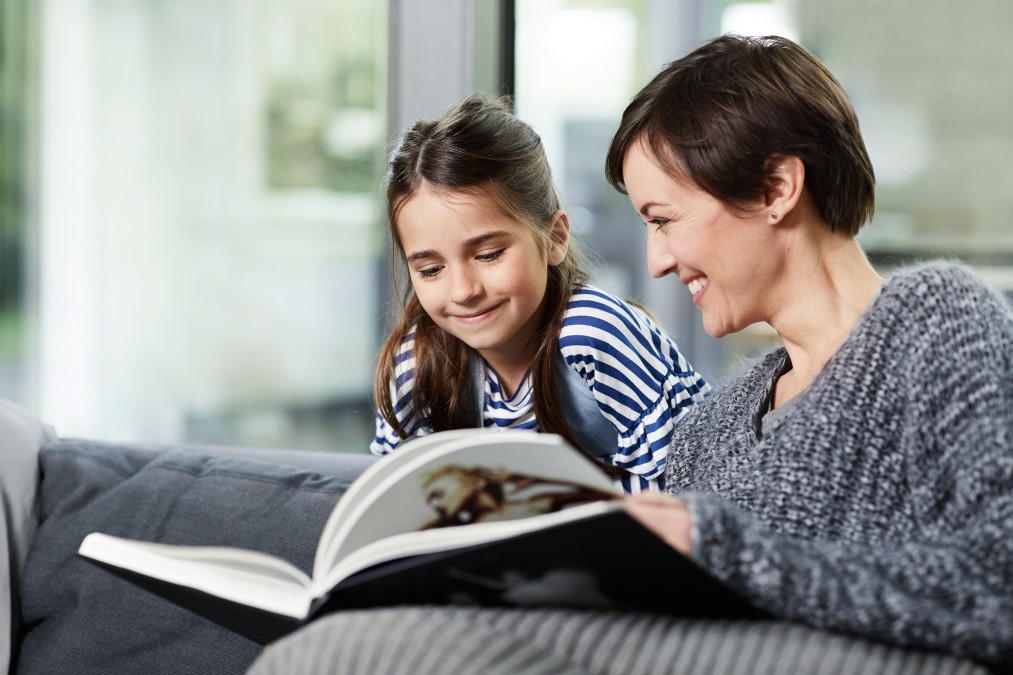 Mother with child reading