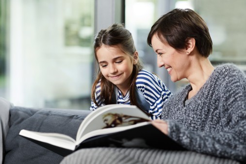 Mother with child reading