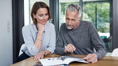 couple reads a brochure